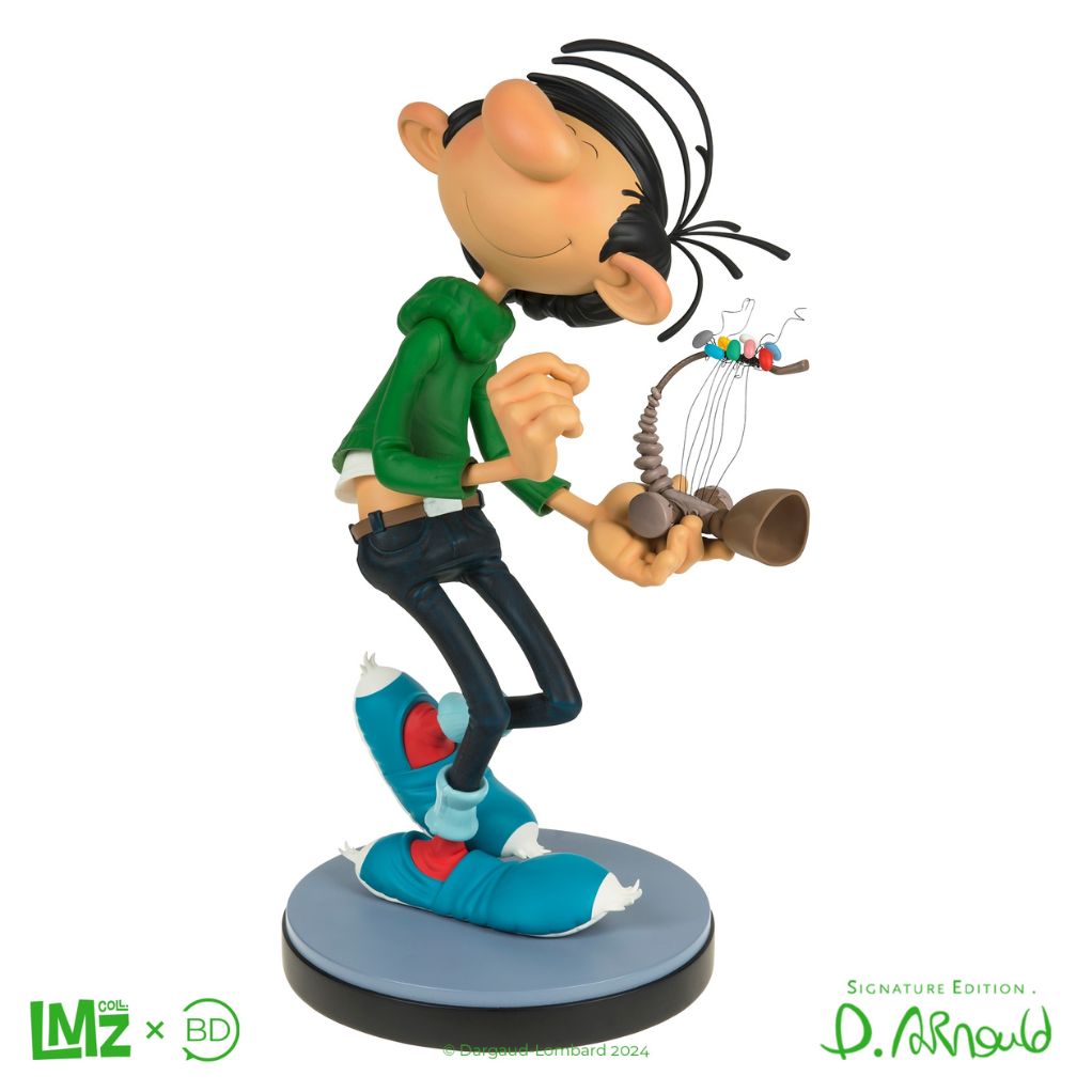 Figurine de collection de Gaston Lagaffe tenant le petit Gaffophone, inspirée de la couverture du tome 6 de la série, édition limitée numérotée