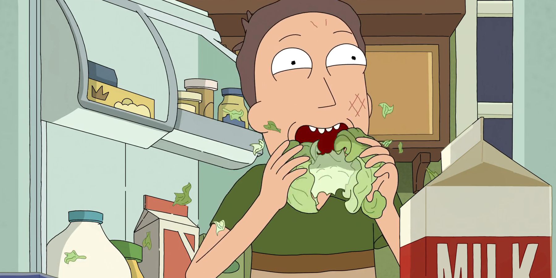 Jerry mangeant joyeusement un chou dans Rick et Morty saison 8.