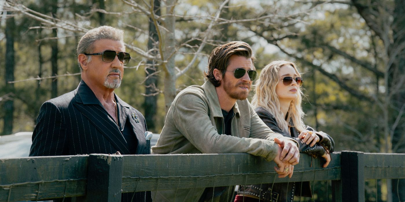Sylvester Stallone, Garrett Hedlund, et Bella Heathcote dans la saison 3 de Tulsa King.