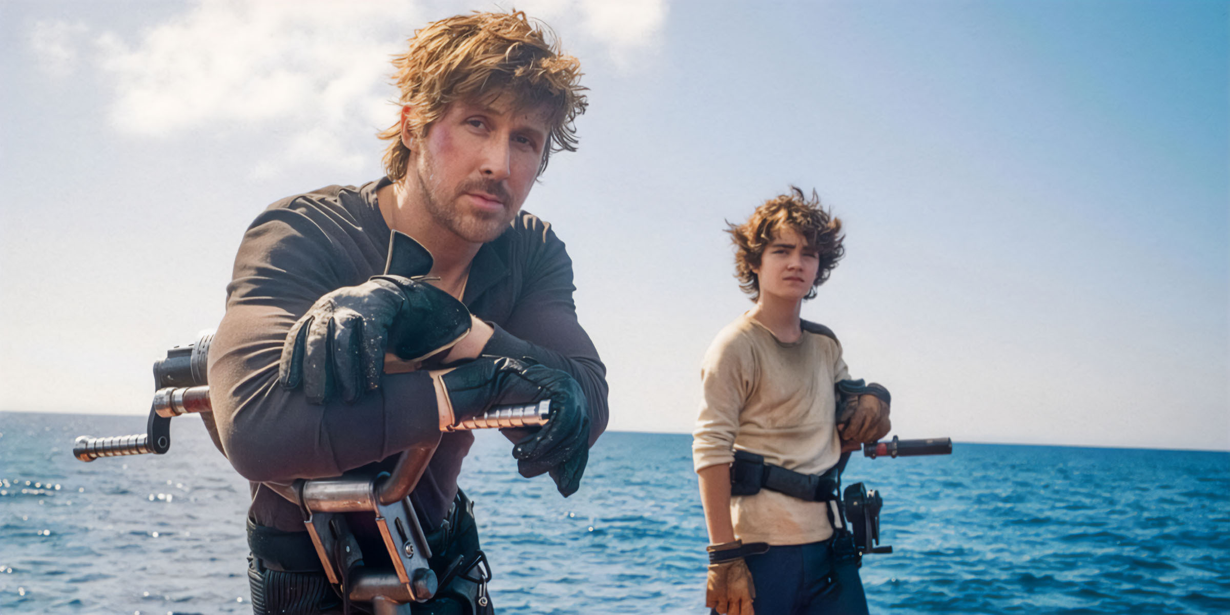Ryan Gosling et Flynn Gray naviguant sur l'océan dans le film Star Wars: Starfighter.
