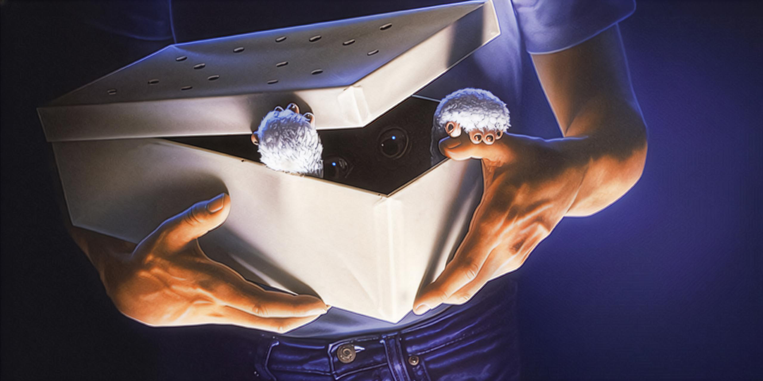 Gizmo dans sa boîte suir l'extrait de l'affiche du film Gremlins.