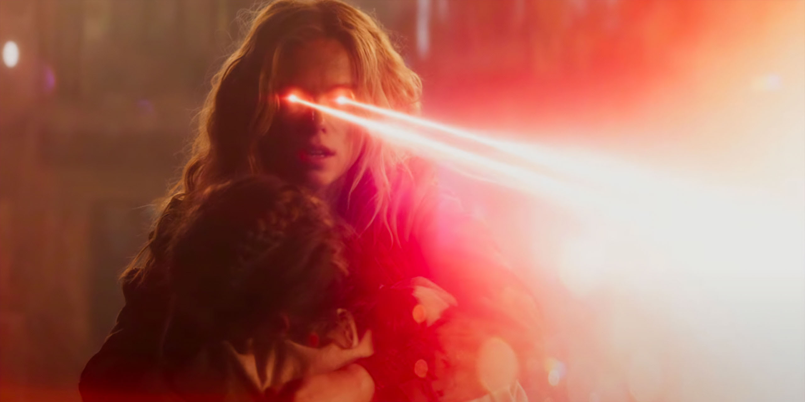 Supergirl lançant des lasers avec ses yeux.