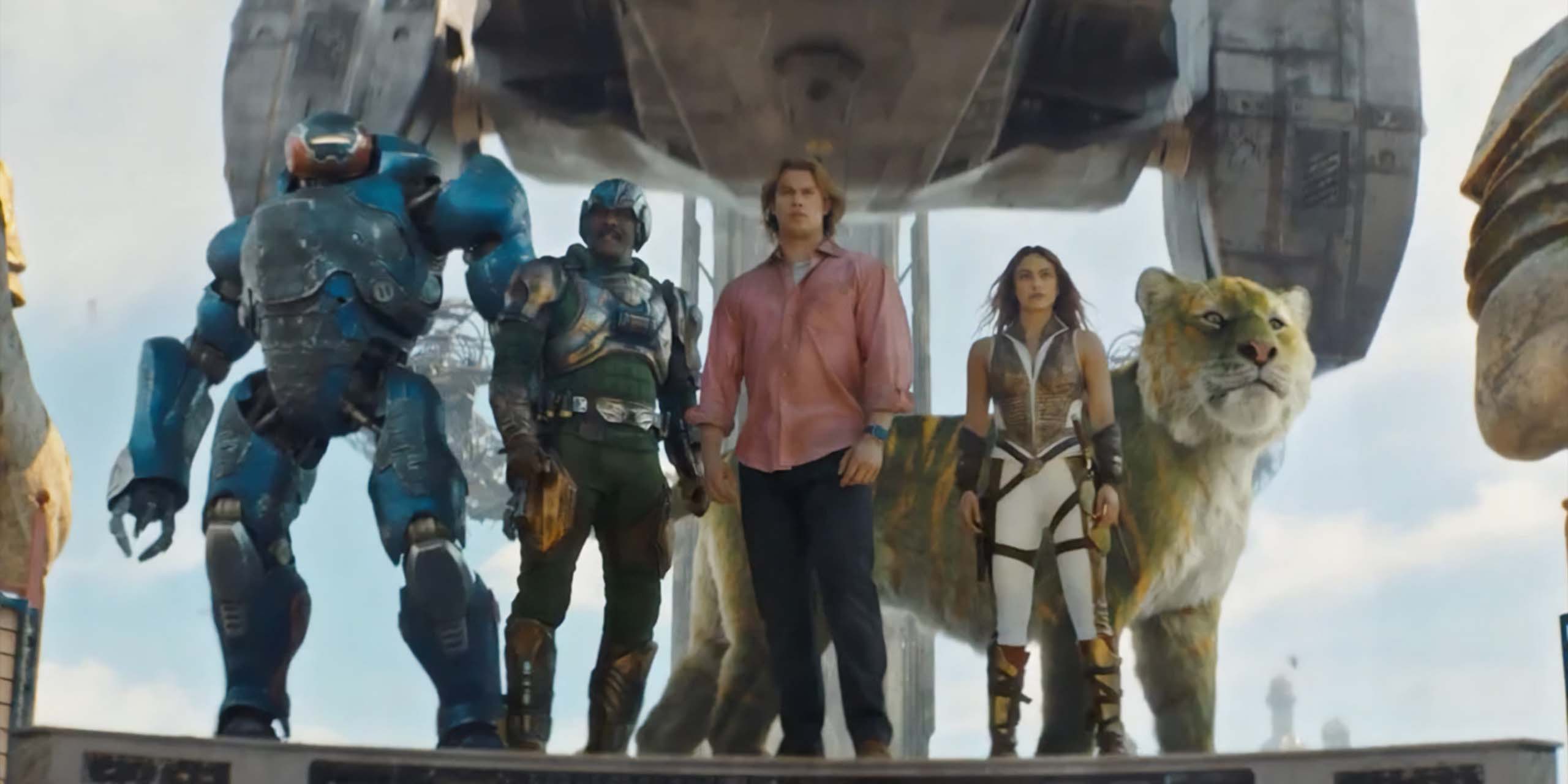 Adam Gleen (Nicholas Galitzine) et ses amis prêts à combattre Skeletor et son armée dans Les maîtres de l'Univers.