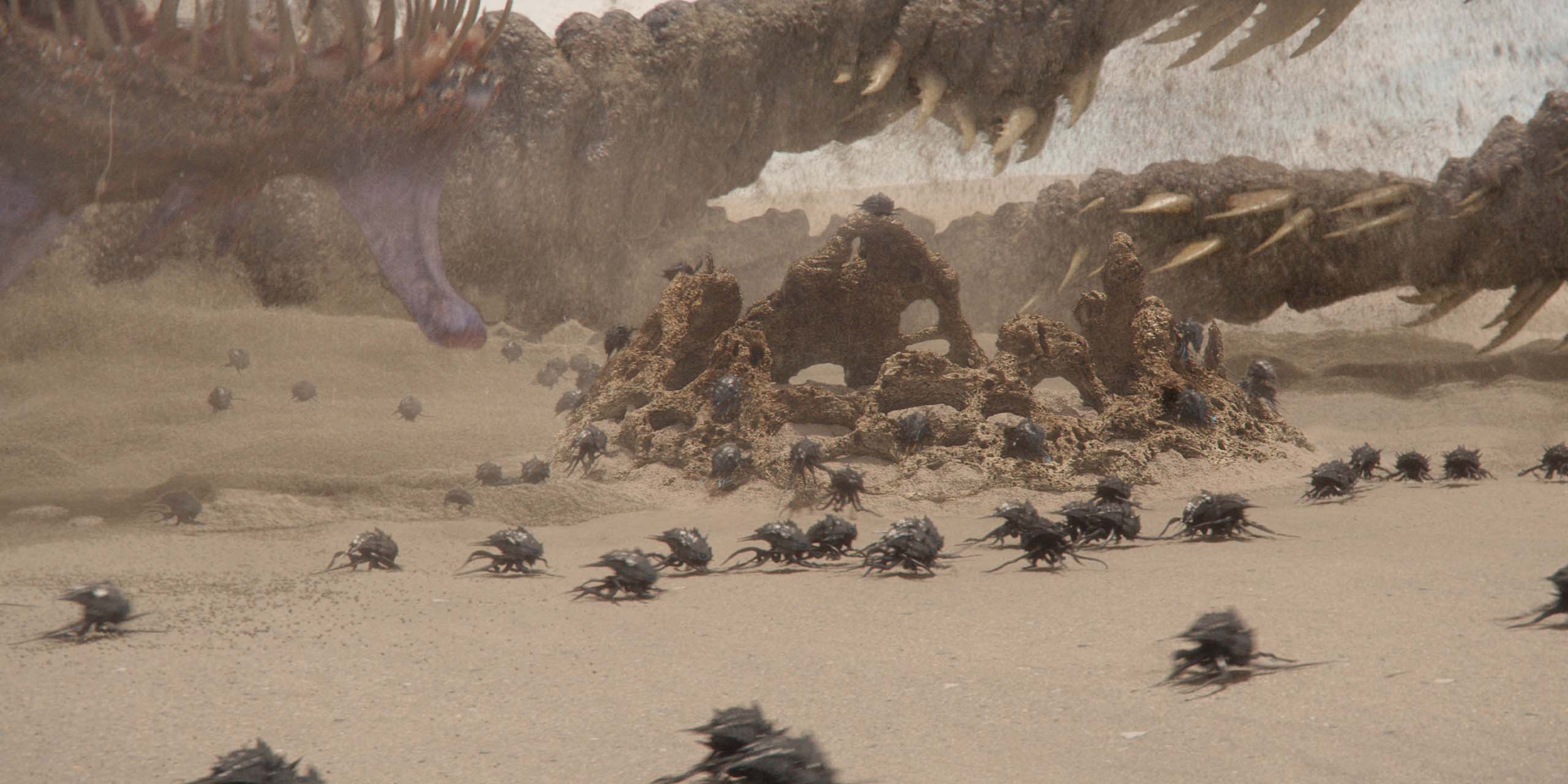 Co-Cai (le Titan X) sur la plage, dans la saison 2 de Monarch: Legacy of Monsters.
