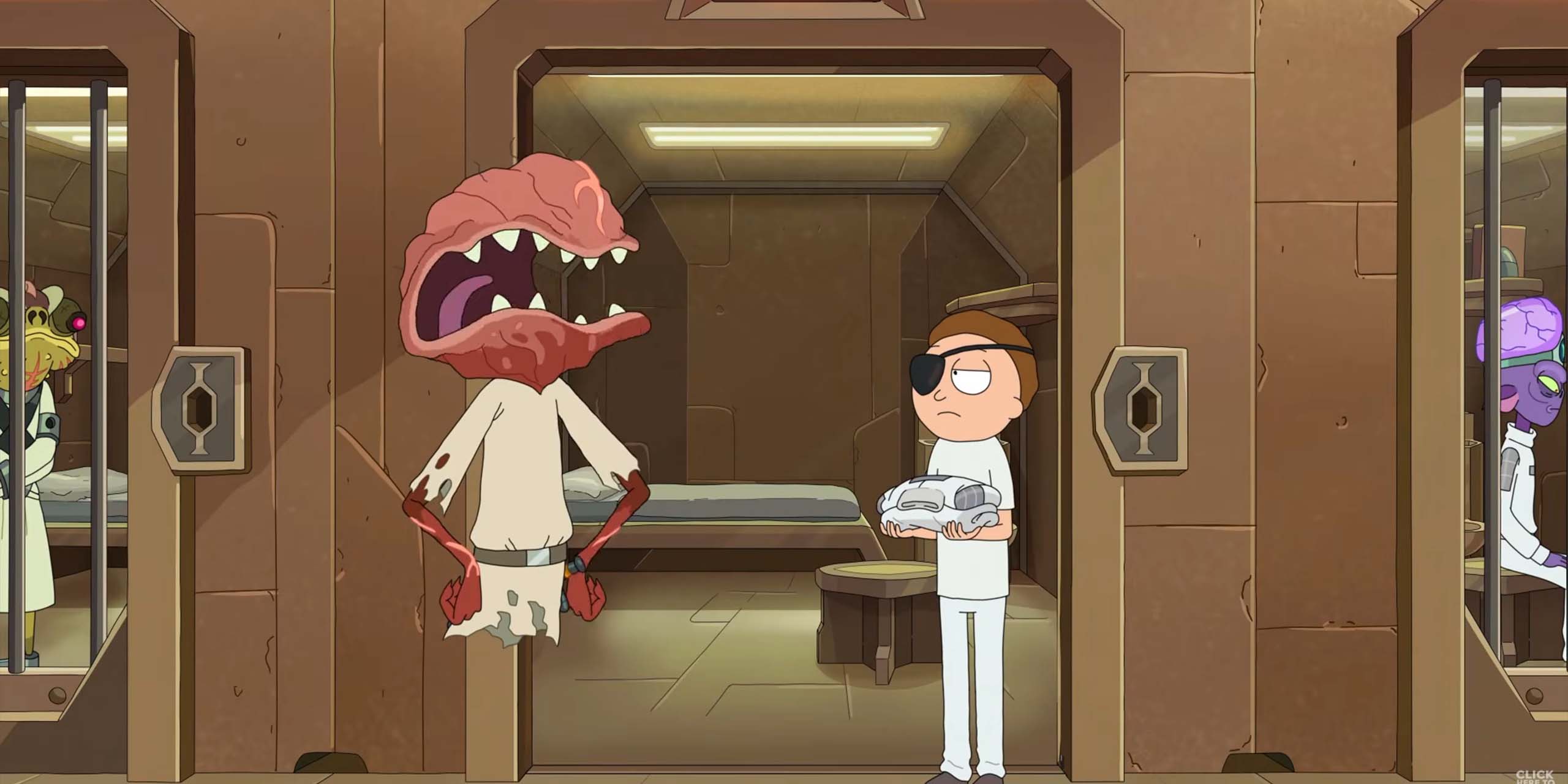 Morty maléfique et un gardien de prison se tiennent devant une cellule dans Rick et Morty saison 9, épisode 1