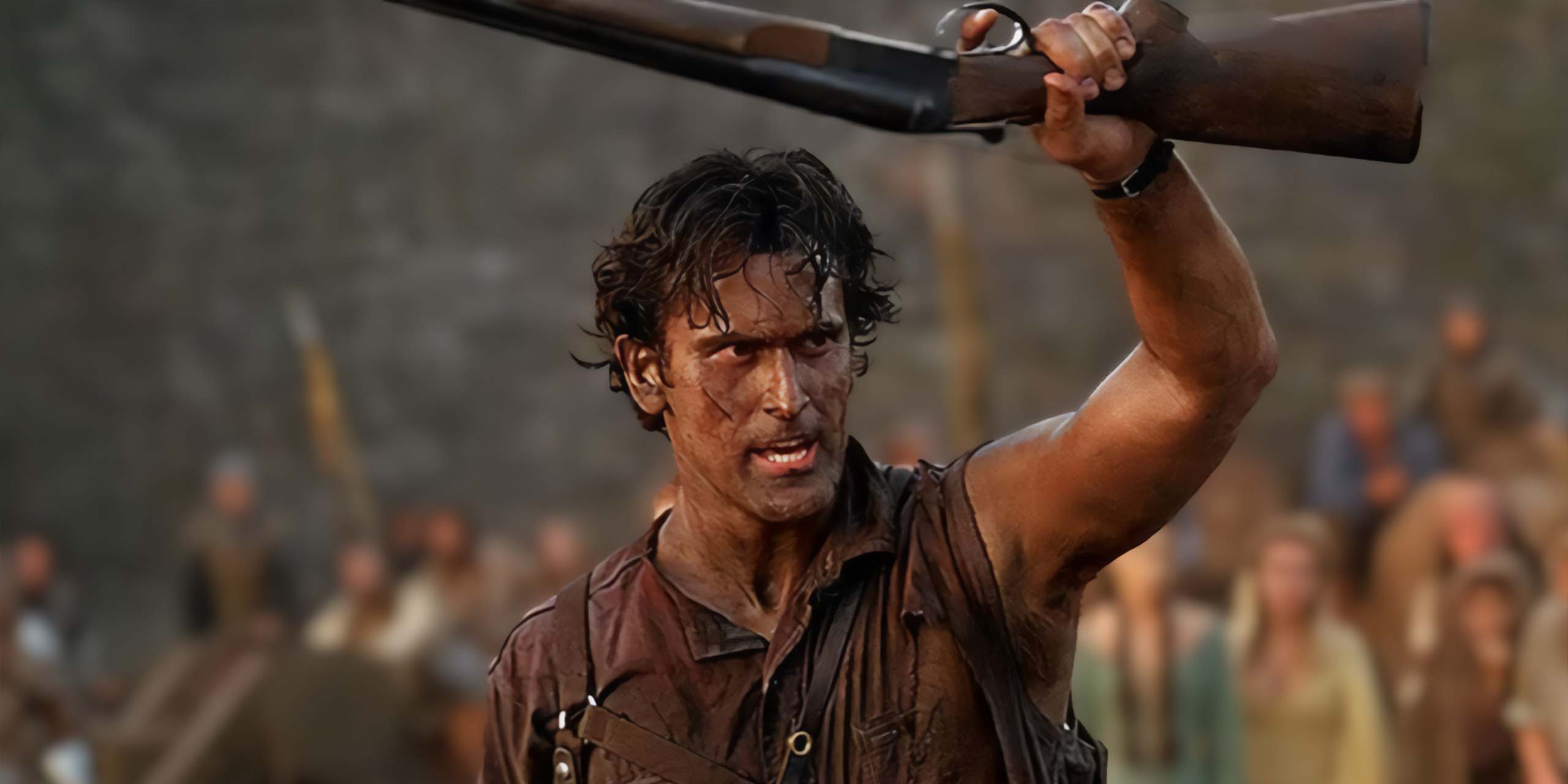 Bruce Campbell brandissant un fusil à pompe dans le rôle d'Ash dans L'Armée des Ténèbres.