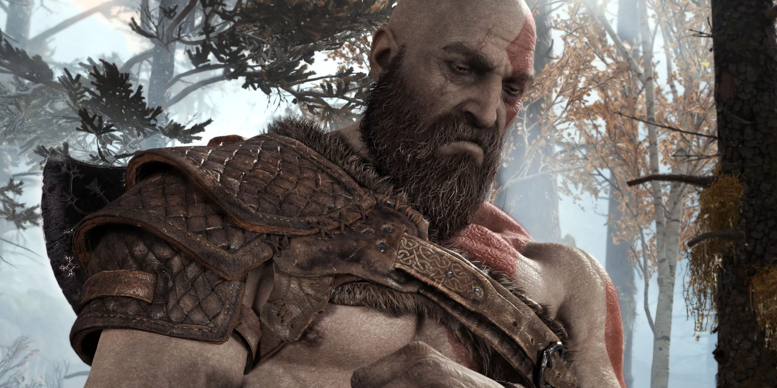 Kratos, triste, dans le jeu God of War.
