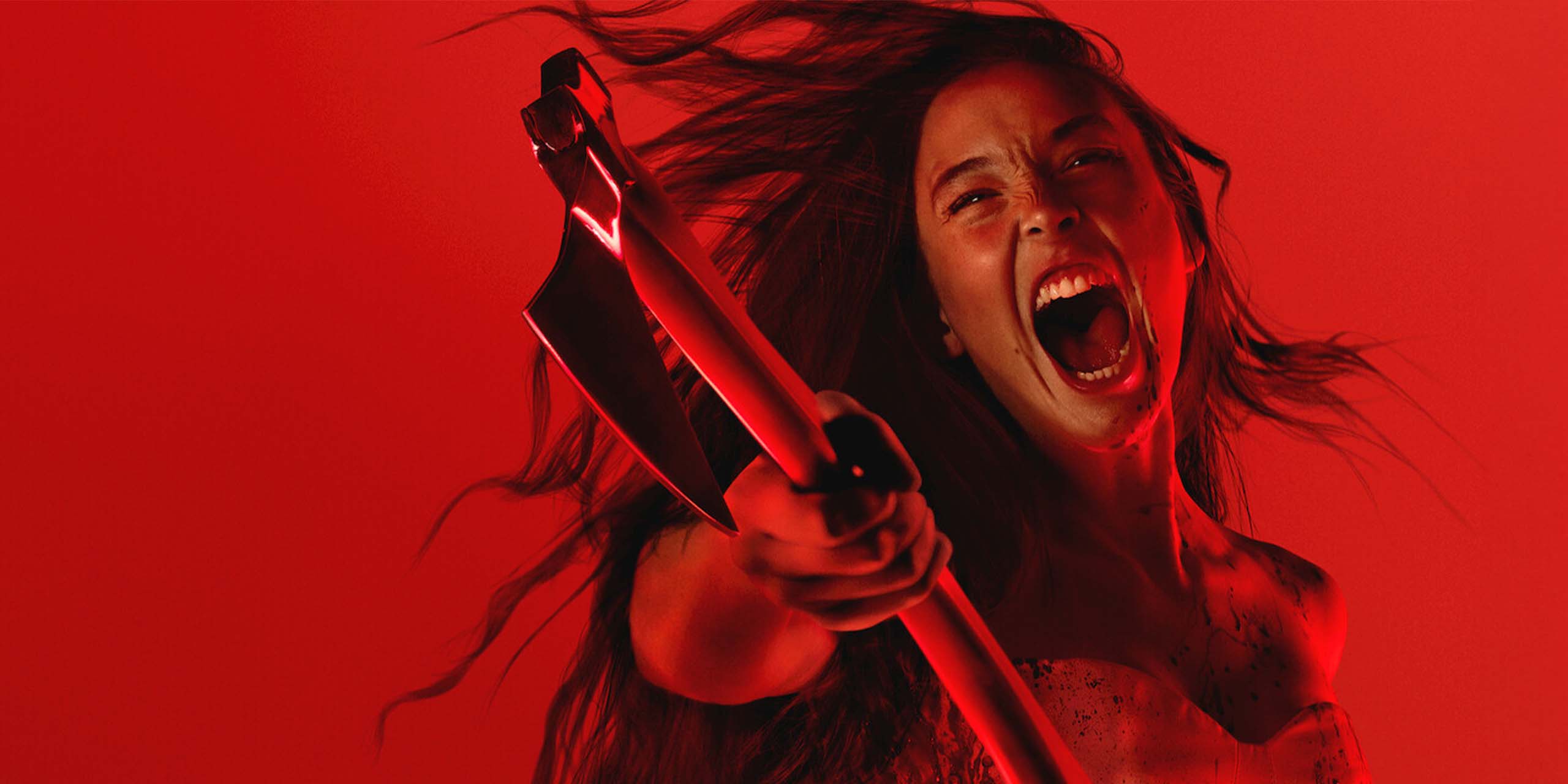 Ella Beatty dans le rôle de Lizzie Borden hurlant avec sa hache dans Monstre : L'histoire de Lizzie Borden.